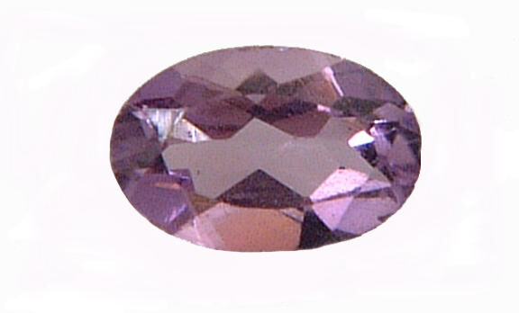 Polished amethyst crystal, a stone used in crystal healing